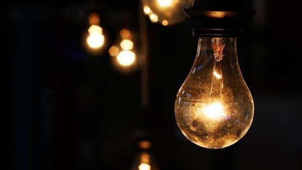 High-voltage power transmission lines at night