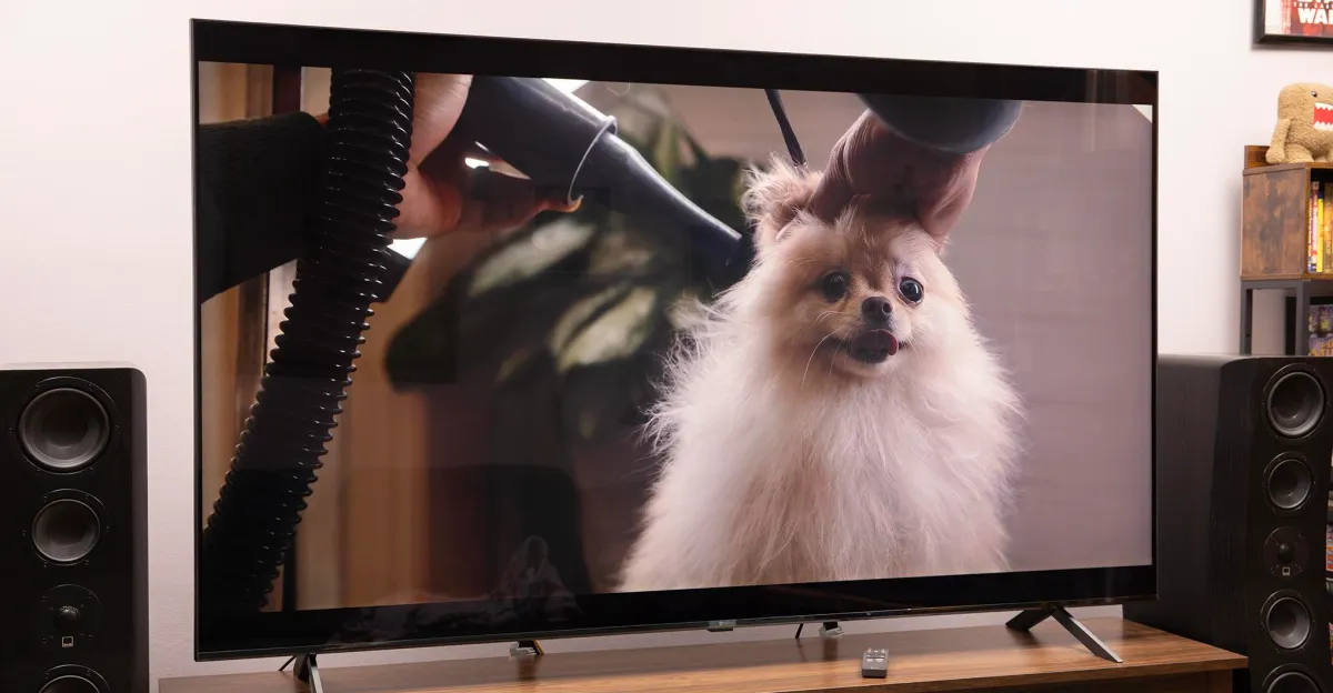 LG Micro RGB evo MRGB95B television displayed on a home theater credenza