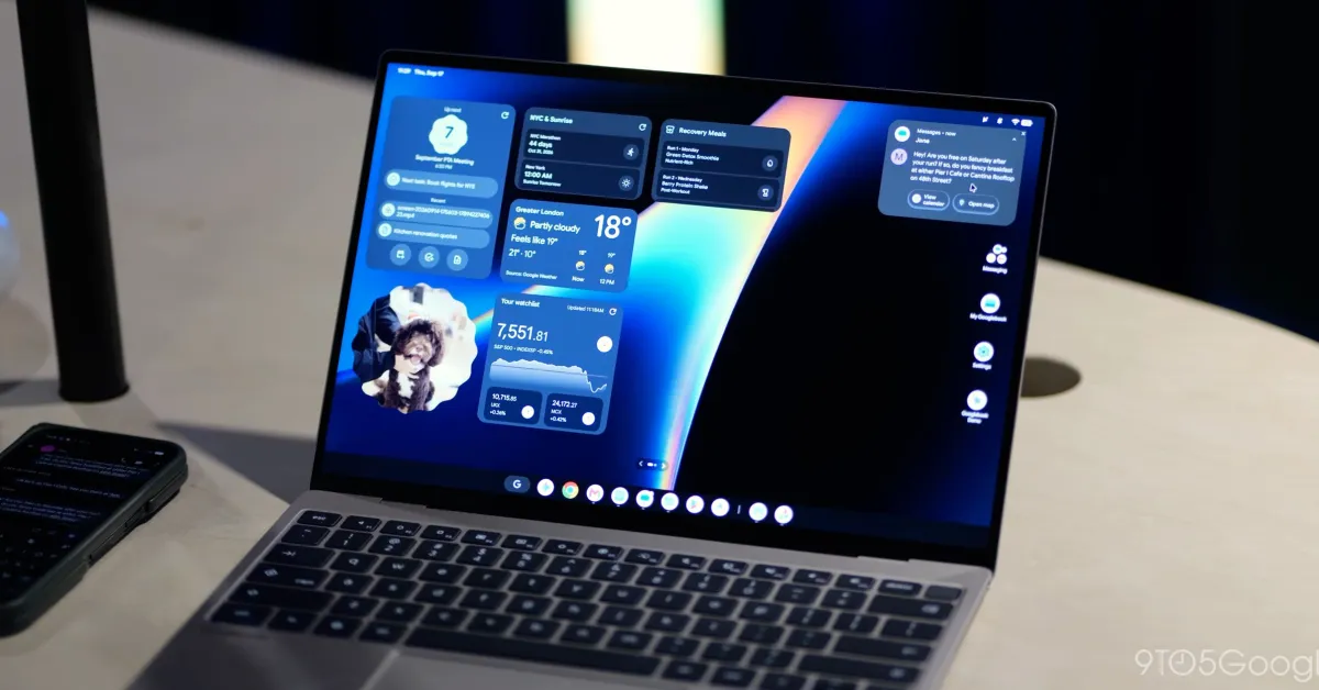 A modern Googlebook laptop sitting open next to an Android smartphone on a desk.