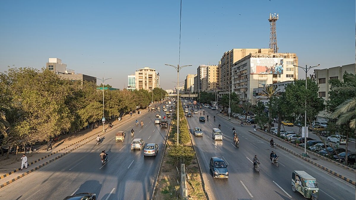 Urban thoroughfare in Karachi undergoing road repairs and beautification work